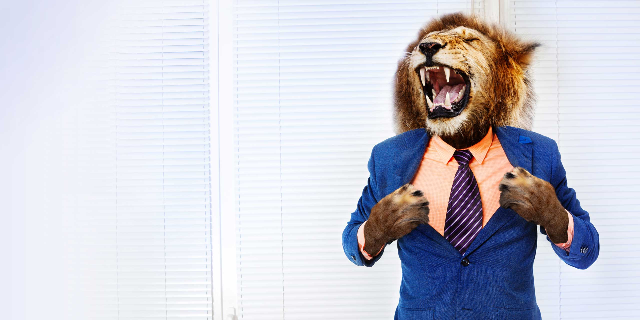 Business Mann mit Löwenkopf